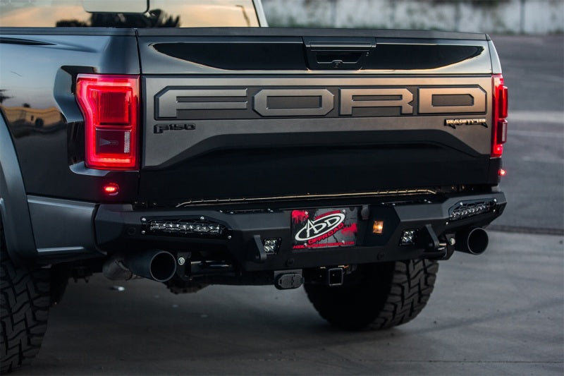 Load image into Gallery viewer, Addictive Desert Designs 17-18 Ford F-150 Raptor HoneyBadger Rear Bumper w/ 10in SR LED Mounts
