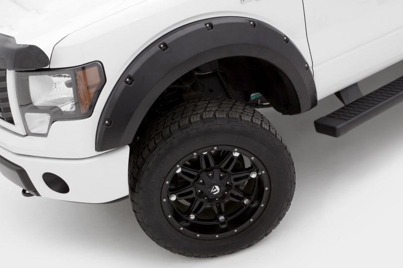 Load image into Gallery viewer, Lund 09-14 Ford F-150 (Ex Raptor) RX-Rivet Style Textured Elite Series Fender Flares - Black (4 Pc.)
