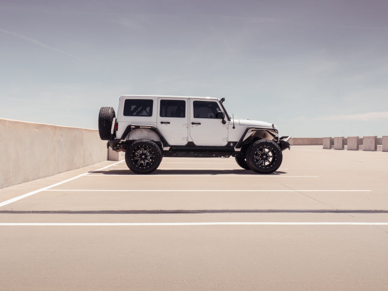 Load image into Gallery viewer, Road Armor 07-18 Jeep Wrangler JKU 4DR Stealth Rear Fender Flare Body Armor - Tex Blk

