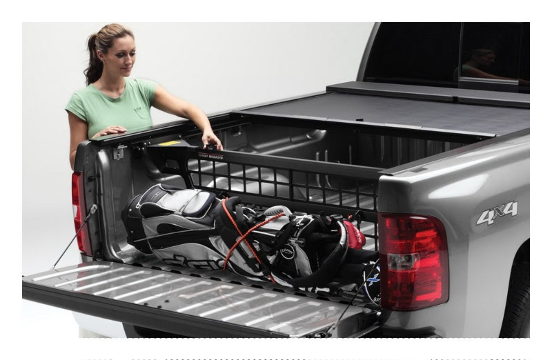 Load image into Gallery viewer, Roll-N-Lock 16-18 Nissan Titan XD Crew Cab SB 77-3/8in Cargo Manager
