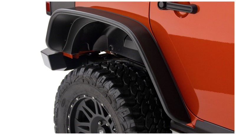 Load image into Gallery viewer, Bushwacker 07-18 Jeep Wrangler Unlimited Flat Style Flares 4pc 4-Door Sport Utility Only - Black
