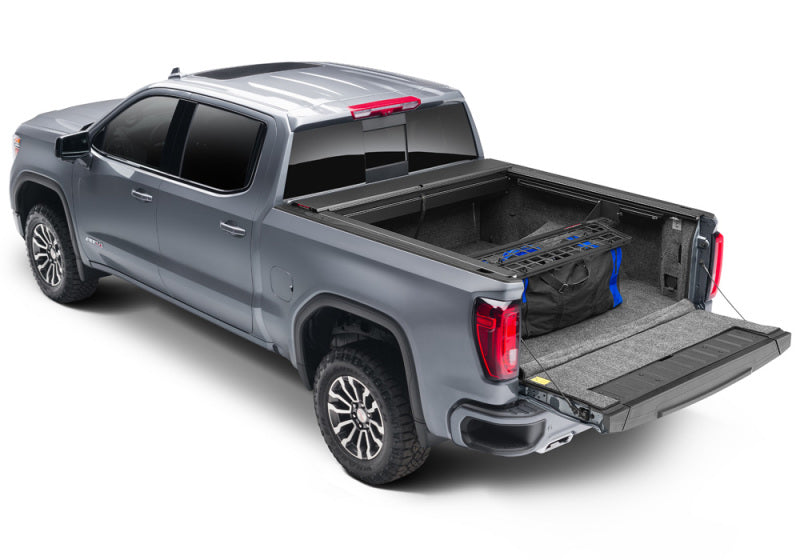 Load image into Gallery viewer, Roll-N-Lock 2020 Chevy Silverado/Sierra 2500/3500 MB 80-1/2in Cargo Manager
