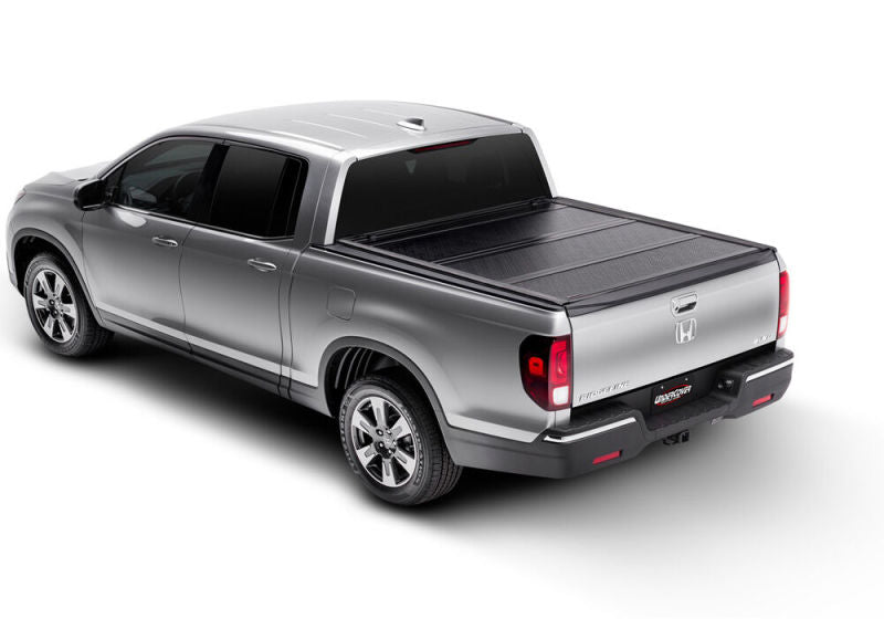 Load image into Gallery viewer, UnderCover 12-17 Isuzu Dmax 5ft Flex Bed Cover
