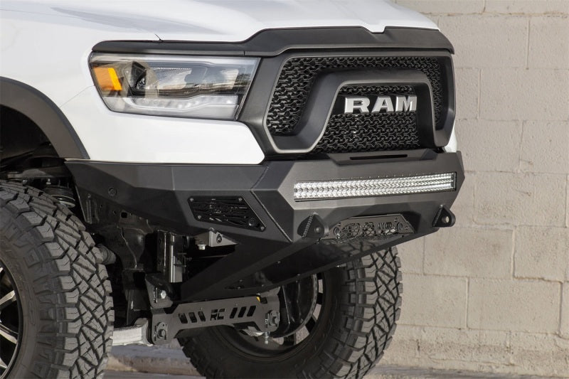 Load image into Gallery viewer, Addictive Desert Designs 2019 Ram Rebel 1500 Stealth Fighter Fr Bumper w/Parking Sensor Cutouts
