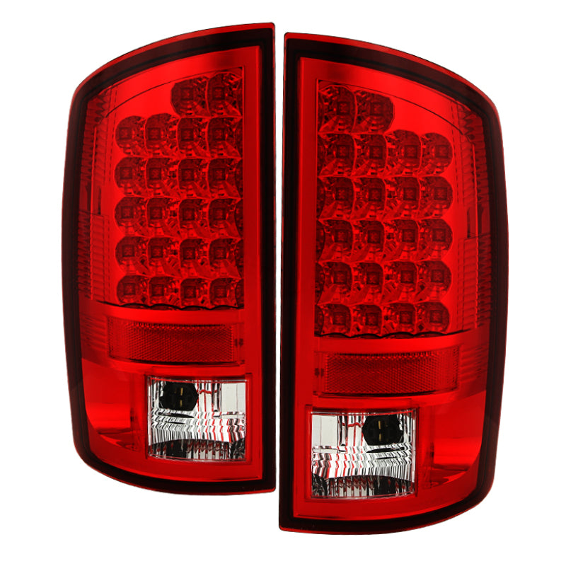 Load image into Gallery viewer, Spyder Dodge Ram 07-08 1500/Ram 07-09 2500/3500 LED Tail Lights Red Clear ALT-YD-DRAM06-LED-RC
