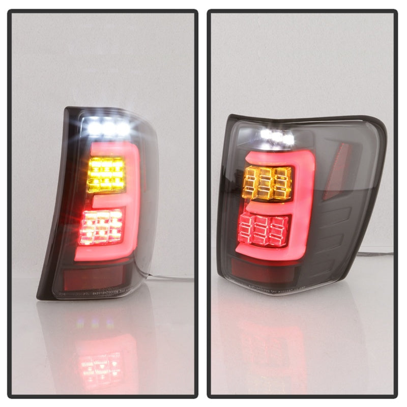 Load image into Gallery viewer, Spyder 99-04 Jeep Grand Cherokee - Light Bar Led Tail Lights - Black - ALT-YD-JGC99V3-BK
