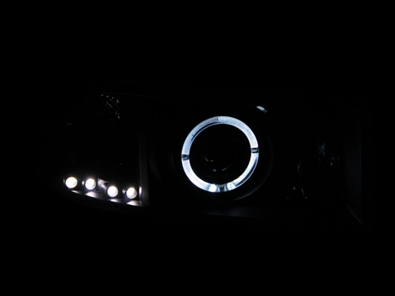 Load image into Gallery viewer, ANZO 1994-2001 Dodge Ram Projector Headlights w/ Halo Black
