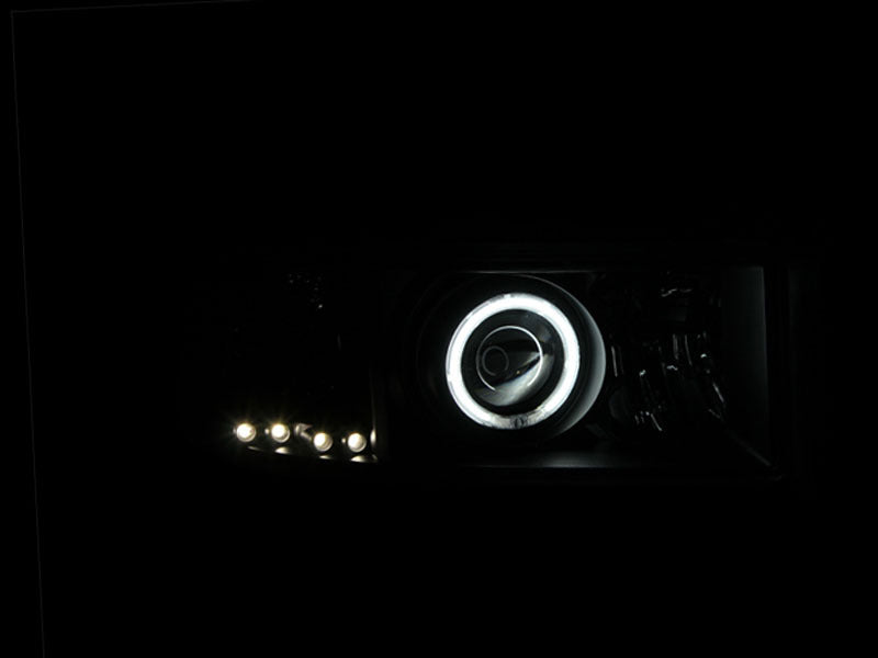 Load image into Gallery viewer, ANZO 1994-2001 Dodge Ram Projector Headlights w/ Halo Black
