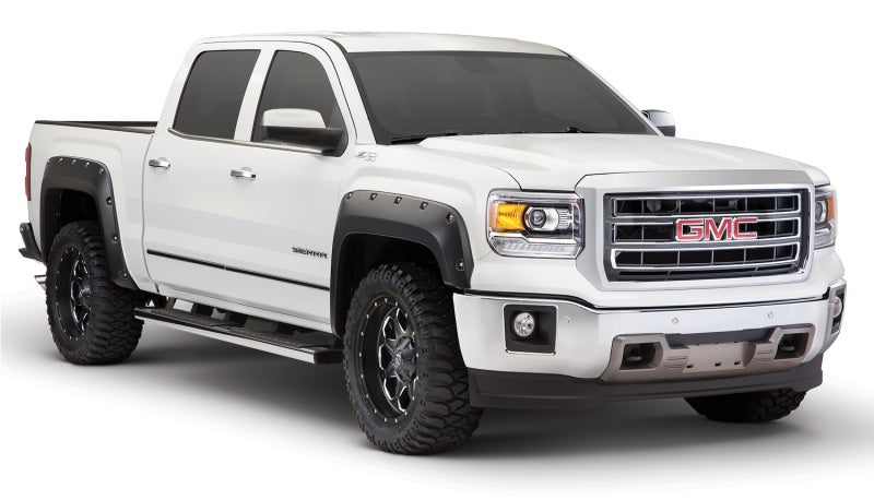 Load image into Gallery viewer, Bushwacker 14-15 GMC Sierra 1500 Pocket Style Flares 4pc - Black
