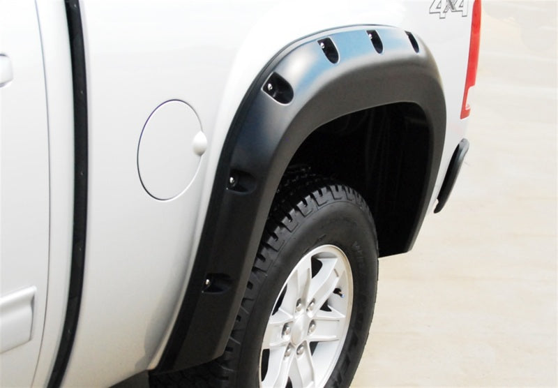 Load image into Gallery viewer, Lund 07-13 GMC Sierra 1500 RX-Rivet Style Smooth Elite Series Fender Flares - Black (4 Pc.)
