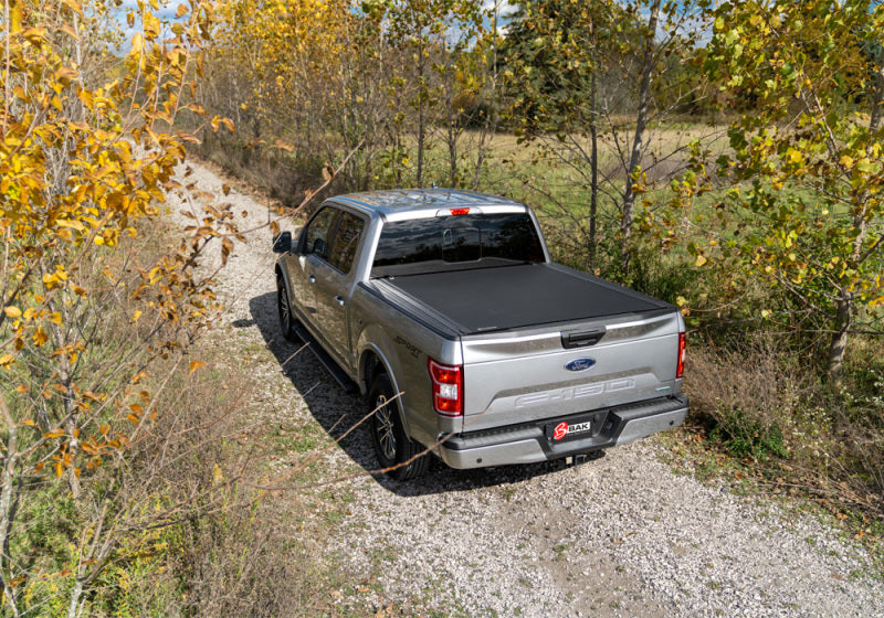 Load image into Gallery viewer, BAK 20-21 Chevy Silverado/GM Sierra HD 2500/3500 Revolver X4s 6.10ft Bed Cover
