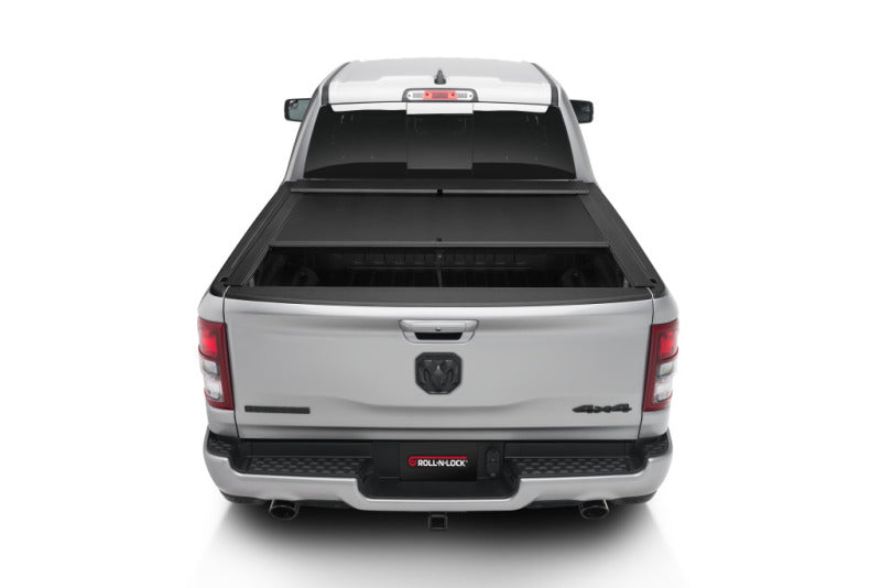 Load image into Gallery viewer, Roll-N-Lock 19-23 RAM 1500 w/o Swing Gate Tailgate SB 76.3in M-Series Retractable Tonneau Cover
