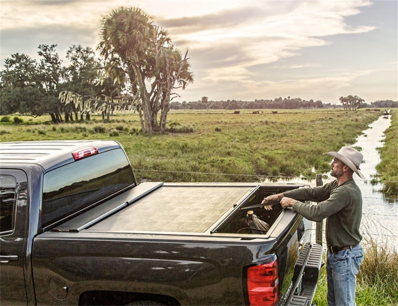 Load image into Gallery viewer, Roll-N-Lock 2020 Chevy Silverado / GMC Sierra 2500-3500 80-1/2in M-Series Retractable Tonneau Cover
