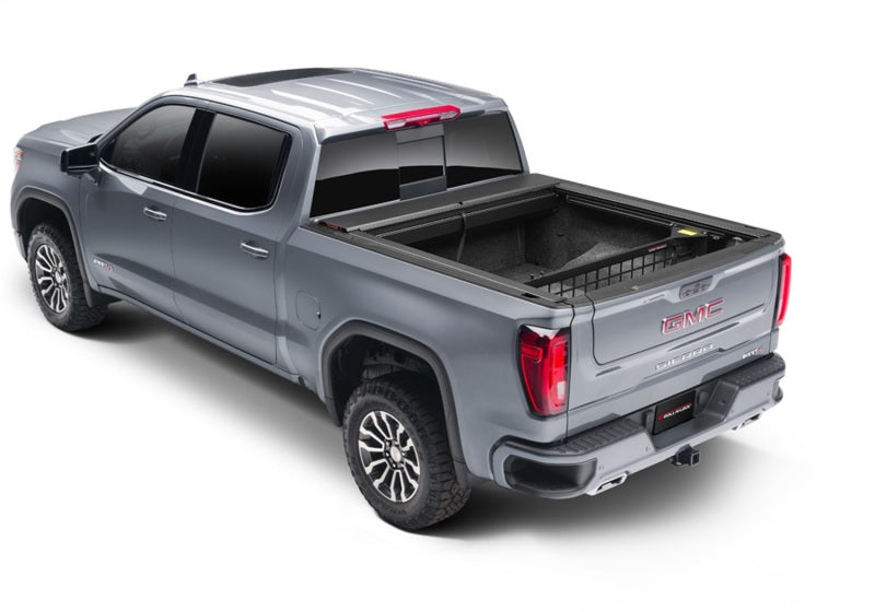 Load image into Gallery viewer, Roll-N-Lock 2020 Chevy Silverado/Sierra 2500/3500 MB 80-1/2in Cargo Manager
