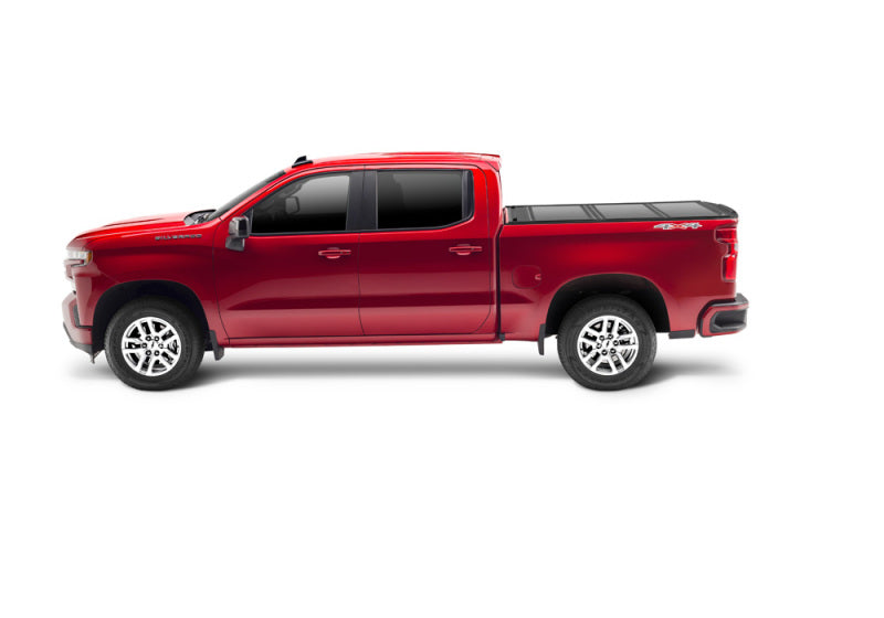 Load image into Gallery viewer, UnderCover 16-20 Nissan Navara 5ft Ultra Flex Bed Cover - Matte Black Finish
