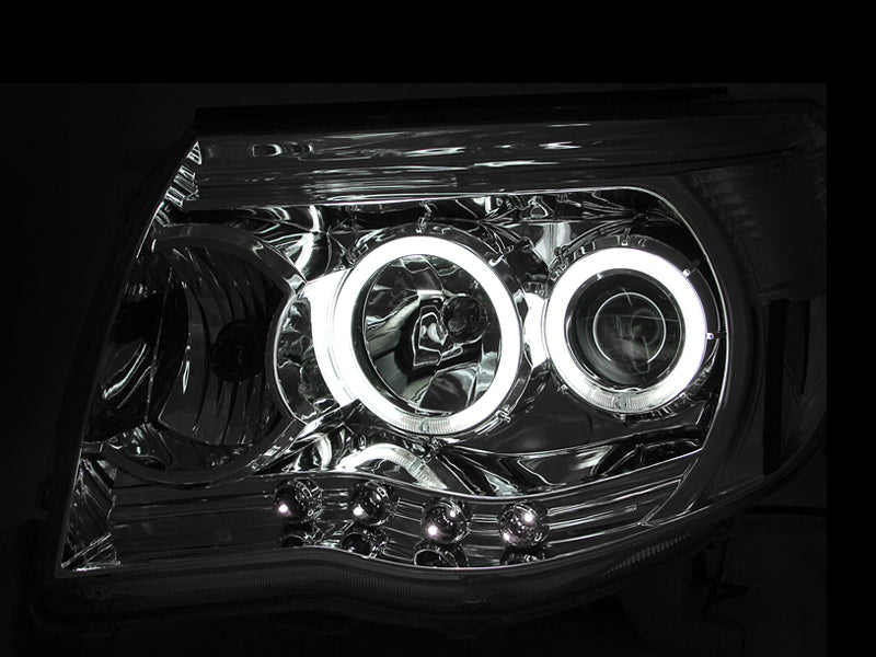 Load image into Gallery viewer, ANZO 2005-2011 Toyota Tacoma Projector Headlights w/ Halos Chrome
