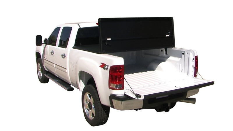 Load image into Gallery viewer, Tonno Pro 04-15 Nissan Titan 5.5ft (Incl 42-498 Utility Track Kit) Hard Fold Tonneau Cover
