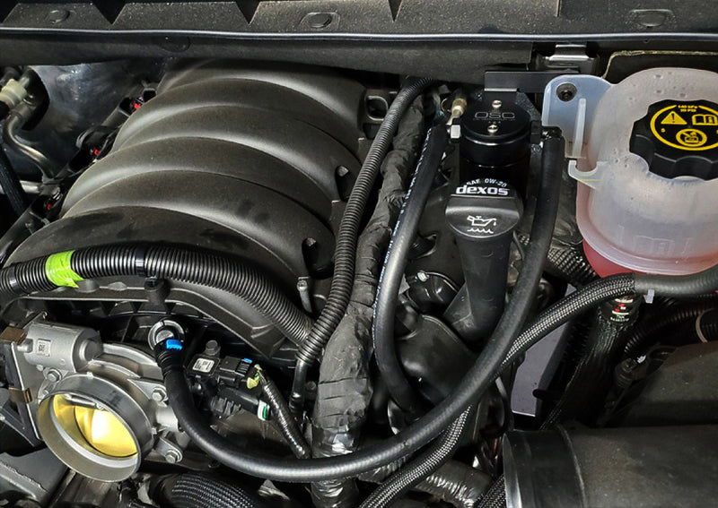 Load image into Gallery viewer, J&amp;L 19-26 Chevrolet Silverado/GMC Sierra 1500 5.3L V8 Driver Side Oil Separator 3.0 - Black Anod
