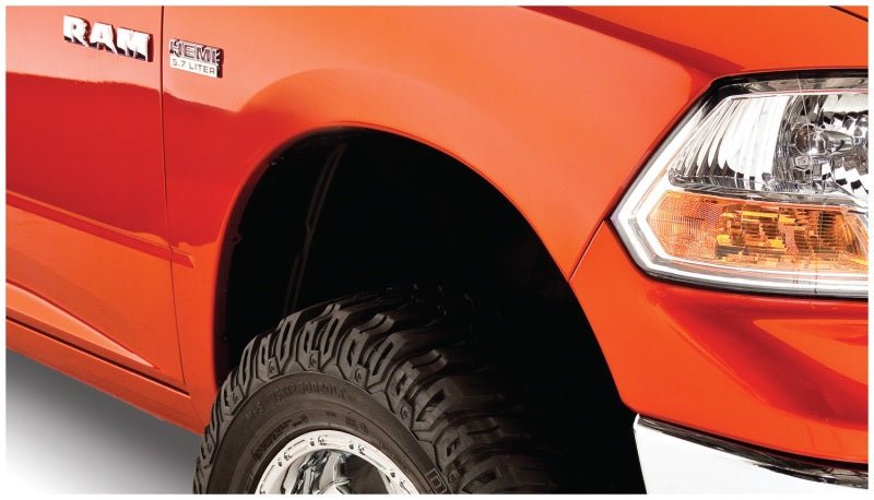 Load image into Gallery viewer, Bushwacker 09-18 Dodge Ram 1500 Fleetside Pocket Style Flares 4pc 67.4/76.3/96.3in Bed - Black
