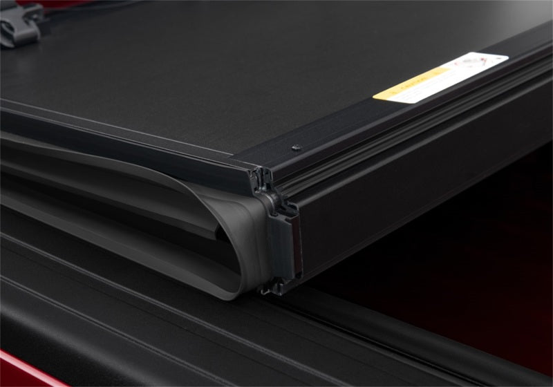 Load image into Gallery viewer, UnderCover 19-20 Ram 1500 6.4ft Armor Flex Bed Cover - Black Textured
