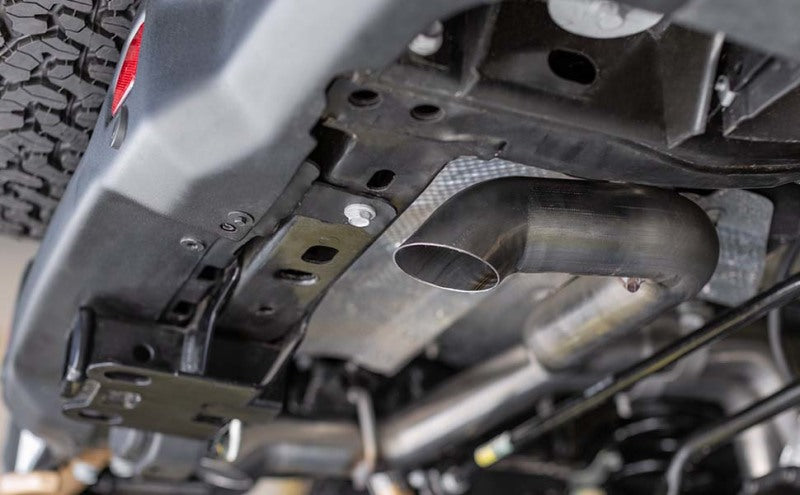 Load image into Gallery viewer, MagnaFlow Cat-Back, SS, 2.5/3in, Turn Down In Front Rear Tire 2015 Ford F150 5.0L V8 Ext Cab
