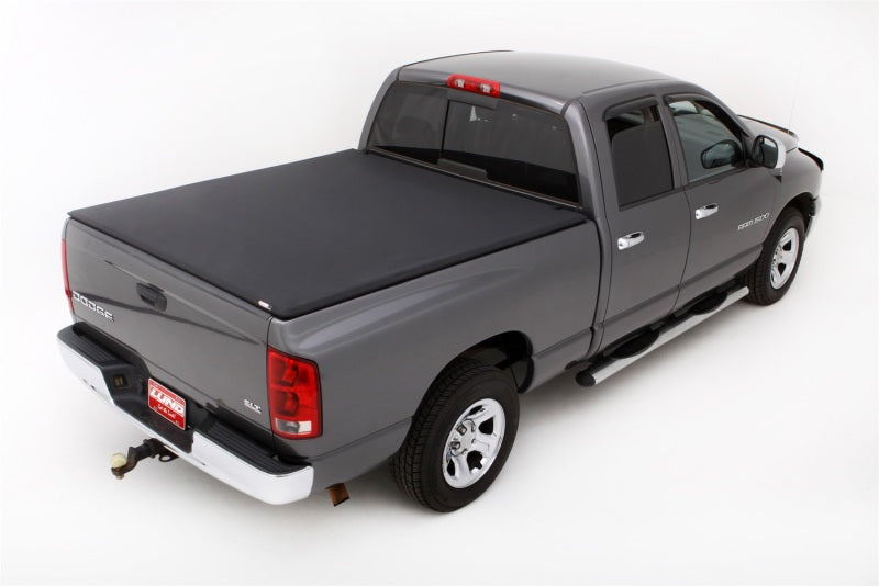 Load image into Gallery viewer, Lund 02-17 Dodge Ram 1500 (6.5ft. Bed Excl. Rambox) Genesis Elite Tri-Fold Tonneau Cover - Black
