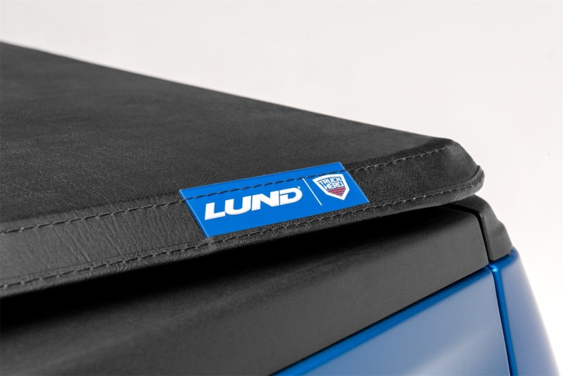 Load image into Gallery viewer, Lund 02-17 Dodge Ram 1500 (5.5ft. Bed) Genesis Tri-Fold Tonneau Cover - Black
