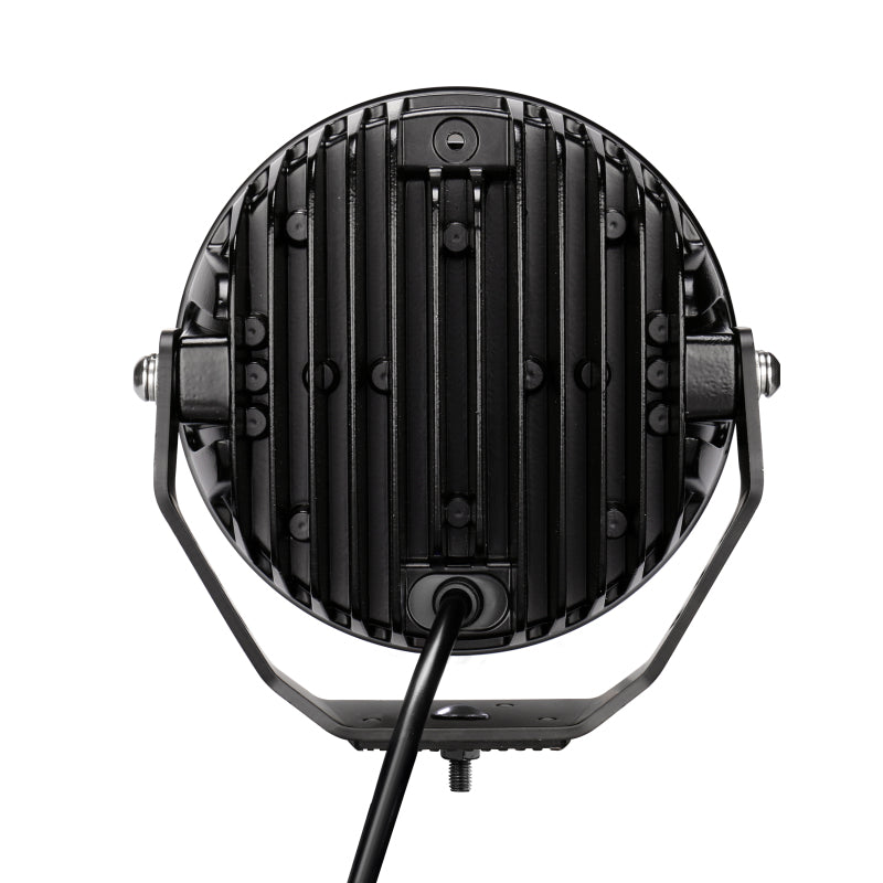 Load image into Gallery viewer, Go Rhino Xplor Blackout Series Round LED Spot Light Beam w/DRL (Surface/Thread Stud Mnt) 7in. - Blk
