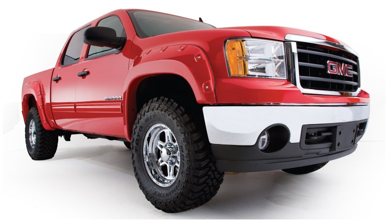 Load image into Gallery viewer, Bushwacker 07-13 GMC Sierra 1500 Fleetside Boss Pocket Style Flares 4pc 69.3in Bed - Black
