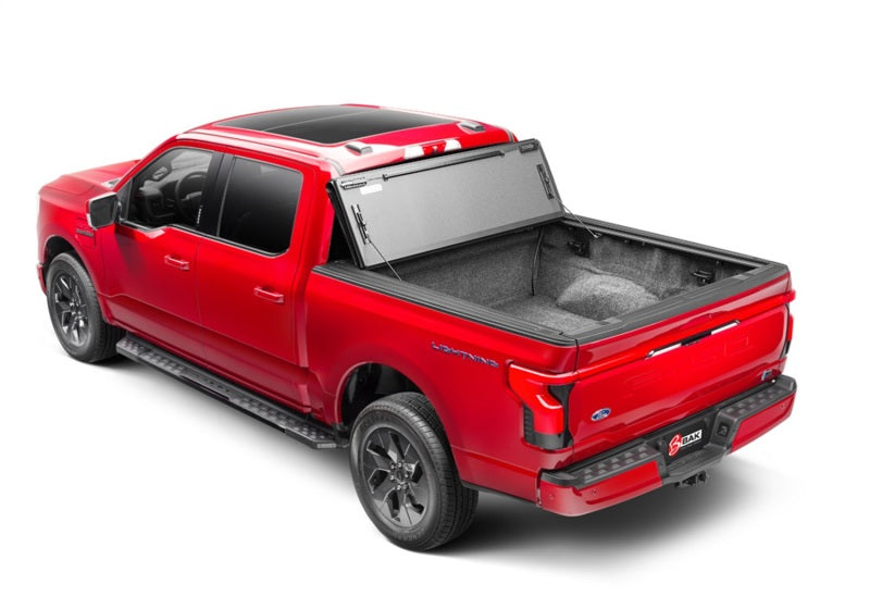 Load image into Gallery viewer, BAK 21-22 Ford F-150 (Incl. 2022 Lightning) BAKFlip MX4 5.7ft Bed Cover - Matte Finish
