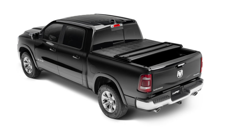 Load image into Gallery viewer, Lund 02-17 Dodge Ram 1500 (5.5ft. Bed) Genesis Tri-Fold Tonneau Cover - Black
