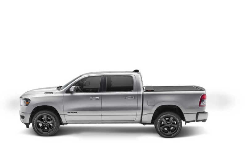 Load image into Gallery viewer, Roll-N-Lock 19-23 RAM 1500 w/o Swing Gate Tailgate SB 76.3in M-Series Retractable Tonneau Cover
