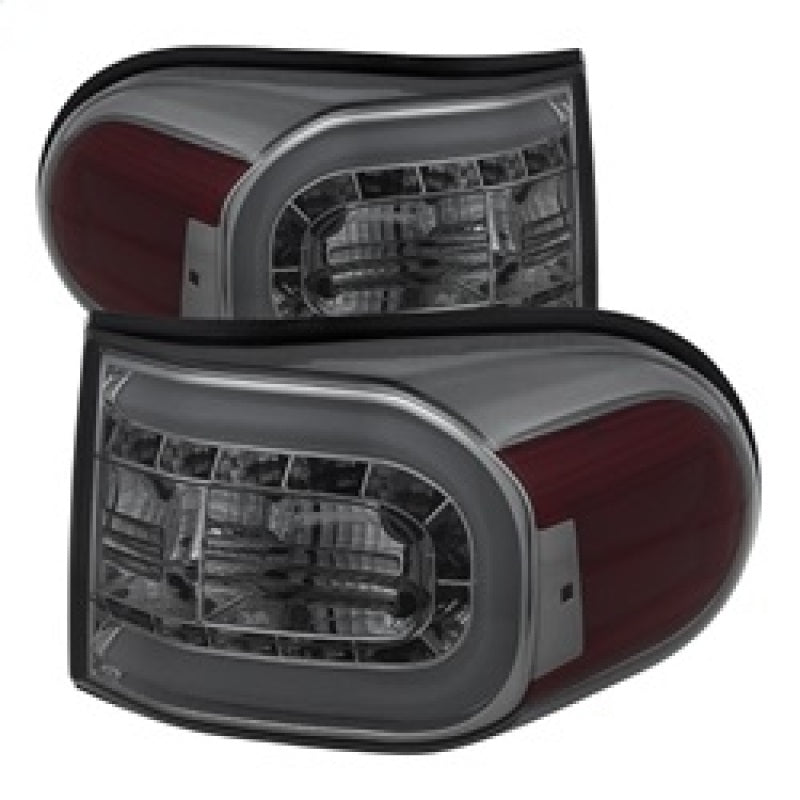 Load image into Gallery viewer, Spyder Toyota FJ Cruiser 07-13 Light Bar LED Tail Lights Smoke ALT-YD-TFJ07-LBLED-SM
