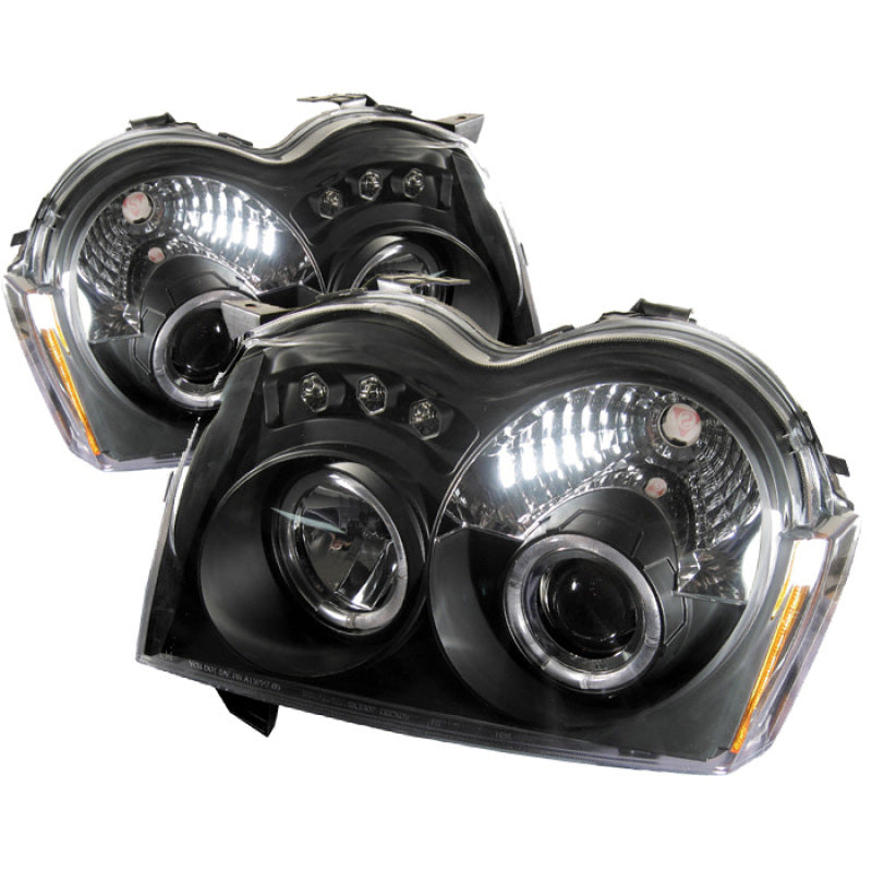 Load image into Gallery viewer, Spyder Jeep Grand Cherokee 05-07 Projector Headlights LED Halo LED Blk Low 9006 PRO-YD-JGC05-HL-BK
