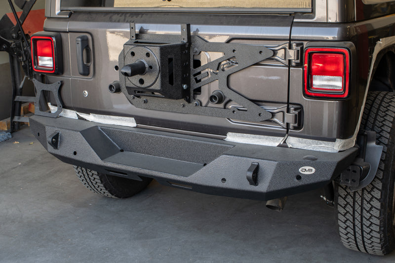 Load image into Gallery viewer, DV8 Offroad 2018+ Jeep Wrangler JL Tailgate Mounted Tire Carrier
