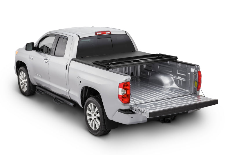 Load image into Gallery viewer, Tonno Pro 07-13 Toyota Tundra 6.5ft Fleetside Hard Fold Tonneau Cover
