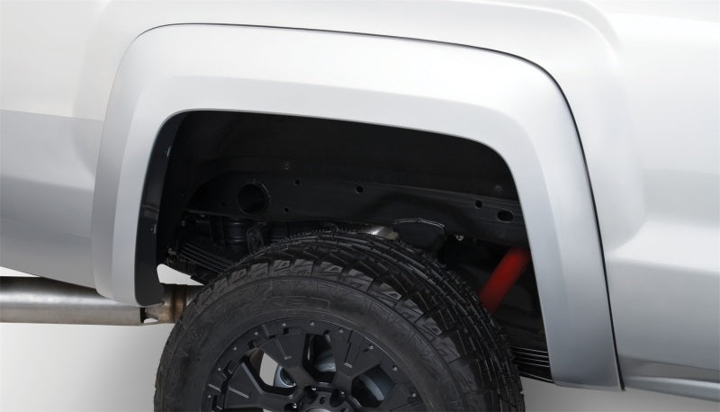 Load image into Gallery viewer, Bushwacker 15-18 GMC Sierra 2500 HD Extend-A-Fender Style Flares 4pc 78.8/97.6in Bed - Black
