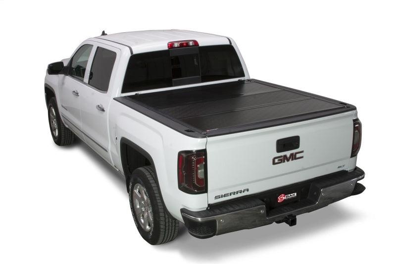 Load image into Gallery viewer, BAK 88-14 Chevy Silverado &amp; C/K 8ft Bed (2014 HD / 2500 / 3500) BAKFlip G2
