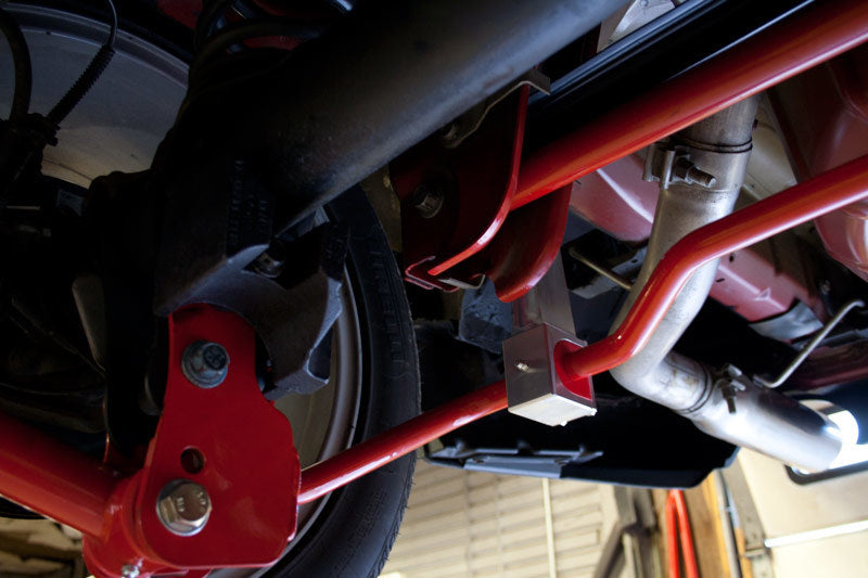 Load image into Gallery viewer, UMI Performance 05-14 Ford Mustang Rear Sway Bar- 22mm Solid CrMo
