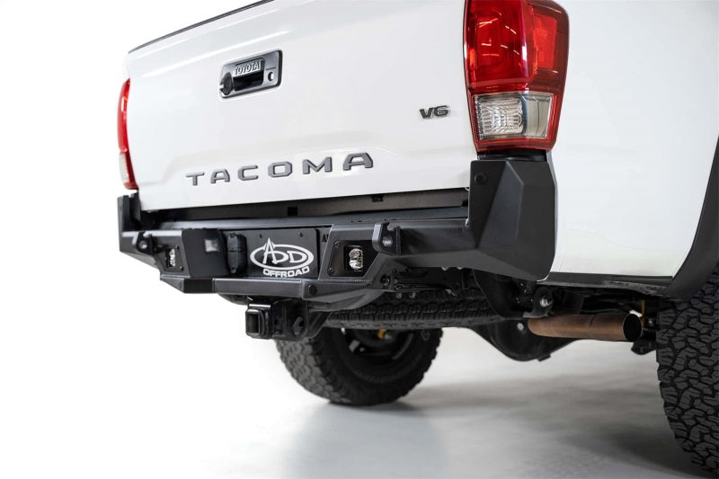 Load image into Gallery viewer, Addictive Desert Designs 16-19 Toyota Tacoma Stealth Fighter Rear Bumper w/ Backup Sensor Cutouts

