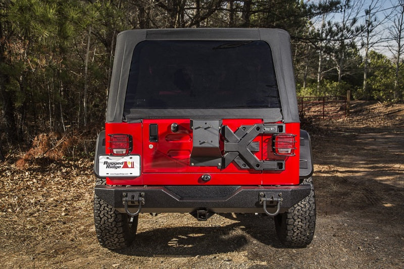 Load image into Gallery viewer, Rugged Ridge Spartacus HD Tire Carrier Whl Mount 87-06 YJ/TJ

