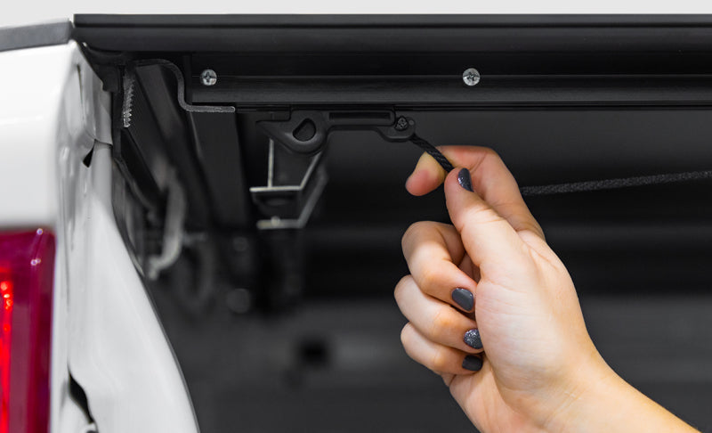 Load image into Gallery viewer, Access LOMAX Carbon Fiber Tri-Fold Cover 2004+ Ford F-150 - 5ft 6in Standard Bed
