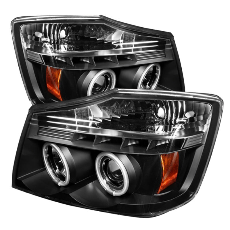 Load image into Gallery viewer, Spyder Nissan Titan 04-14/Armada 04-07 Projector Headlights CCFL Halo LED Blk PRO-YD-NTI04-CCFL-BK
