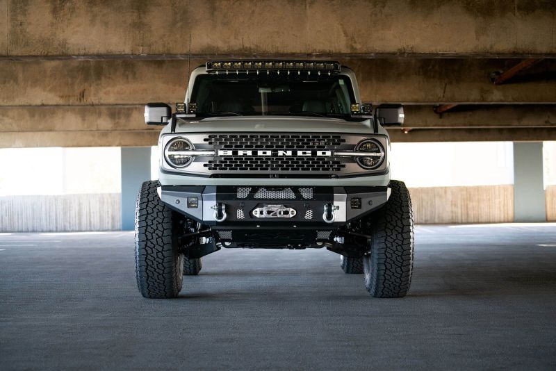 Load image into Gallery viewer, DV8 Offroad 2021+ Ford Bronco Front Bumper Winch Capable w/ Optional Bull Bar/Aux Light Opening

