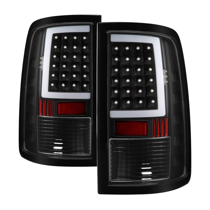 Load image into Gallery viewer, xTune 13-18 Dodge Ram 1500 LED Tail Lights - Black (ALT-ON-DRAM13V2-LBLED-BK)
