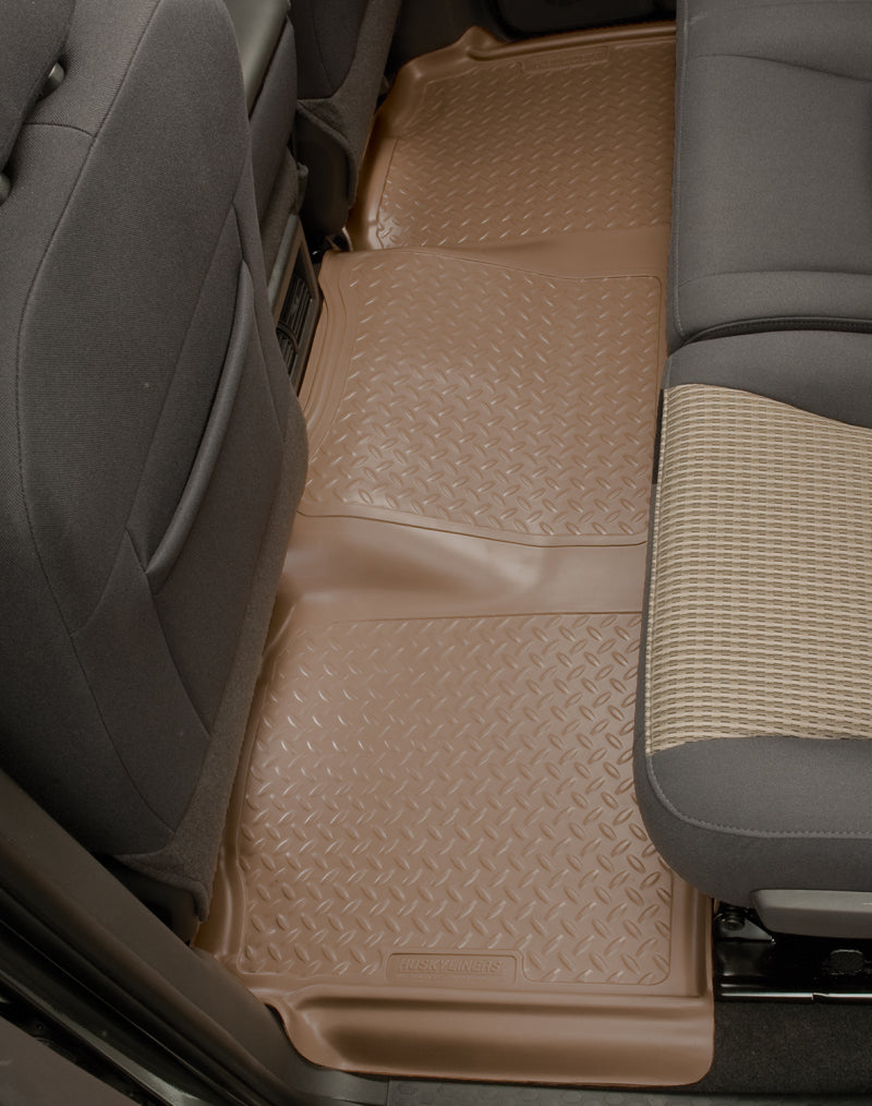 Load image into Gallery viewer, Husky Liners 99-06 Chevy Silverado/GMC Sierra (All Ext. Cab) Classic Style 2nd Row Black Floor Liner
