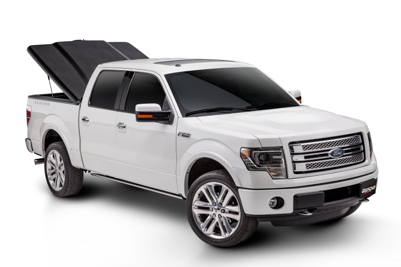 Load image into Gallery viewer, UnderCover 16-20 Toyota Tacoma 6ft Elite Bed Cover - Black Textured (Req Factory Deck Rails)
