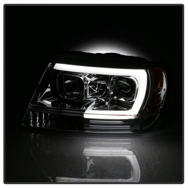 Load image into Gallery viewer, Spyder 99-04 Jeep Grand Cherokee Projector Headlights - Light Bar DRL LED - Chrome
