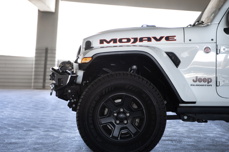 Load image into Gallery viewer, DV8 Offroad 18-23 Jeep Wrangler JL / 20-23 Jeep Gladiator JT FS-7 Mid-Width Winch Front Bumper
