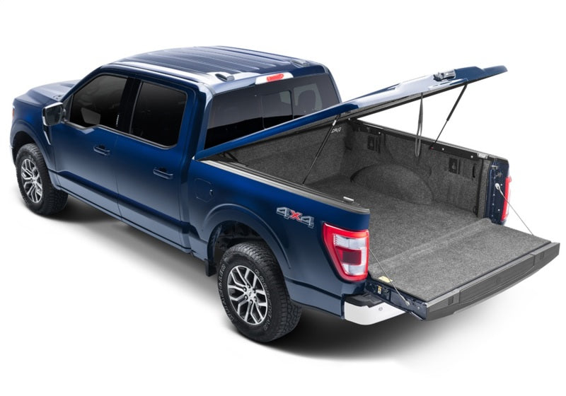 Load image into Gallery viewer, UnderCover 2021 Ford F-150 Ext/Crew Cab 6.5ft Elite Smooth Bed Cover - Ready to Paint
